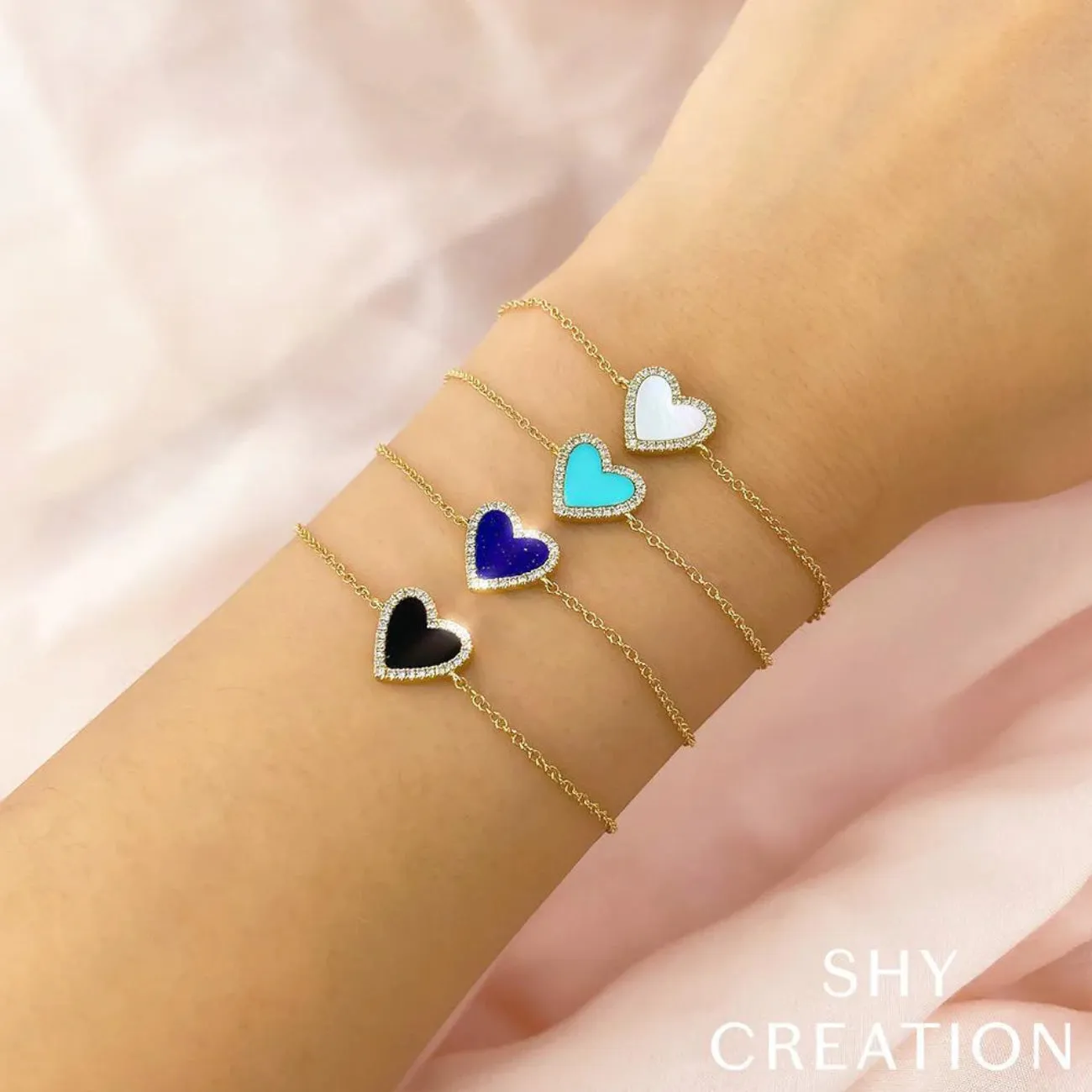 14K Yellow Gold 0.09ct Diamond and 0.56ct Mother of Pearl Heart Bracelet