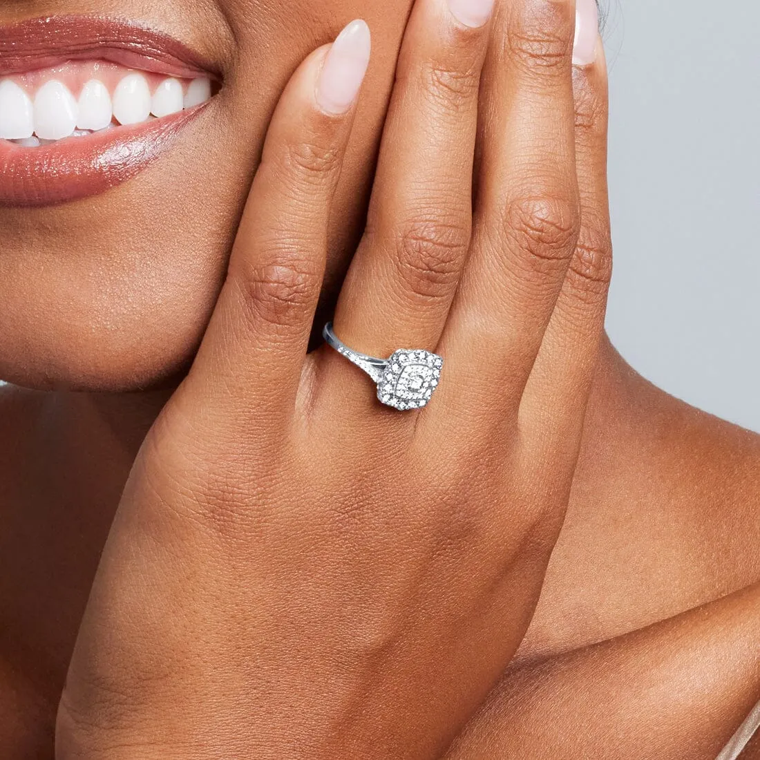 Fancy Miracle Halo Cushion Shaped Ring with 0.16ct Diamonds in 9ct White Gold