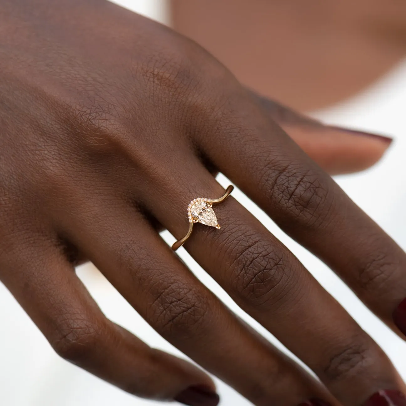 Floating Pear Cut Diamond Ring