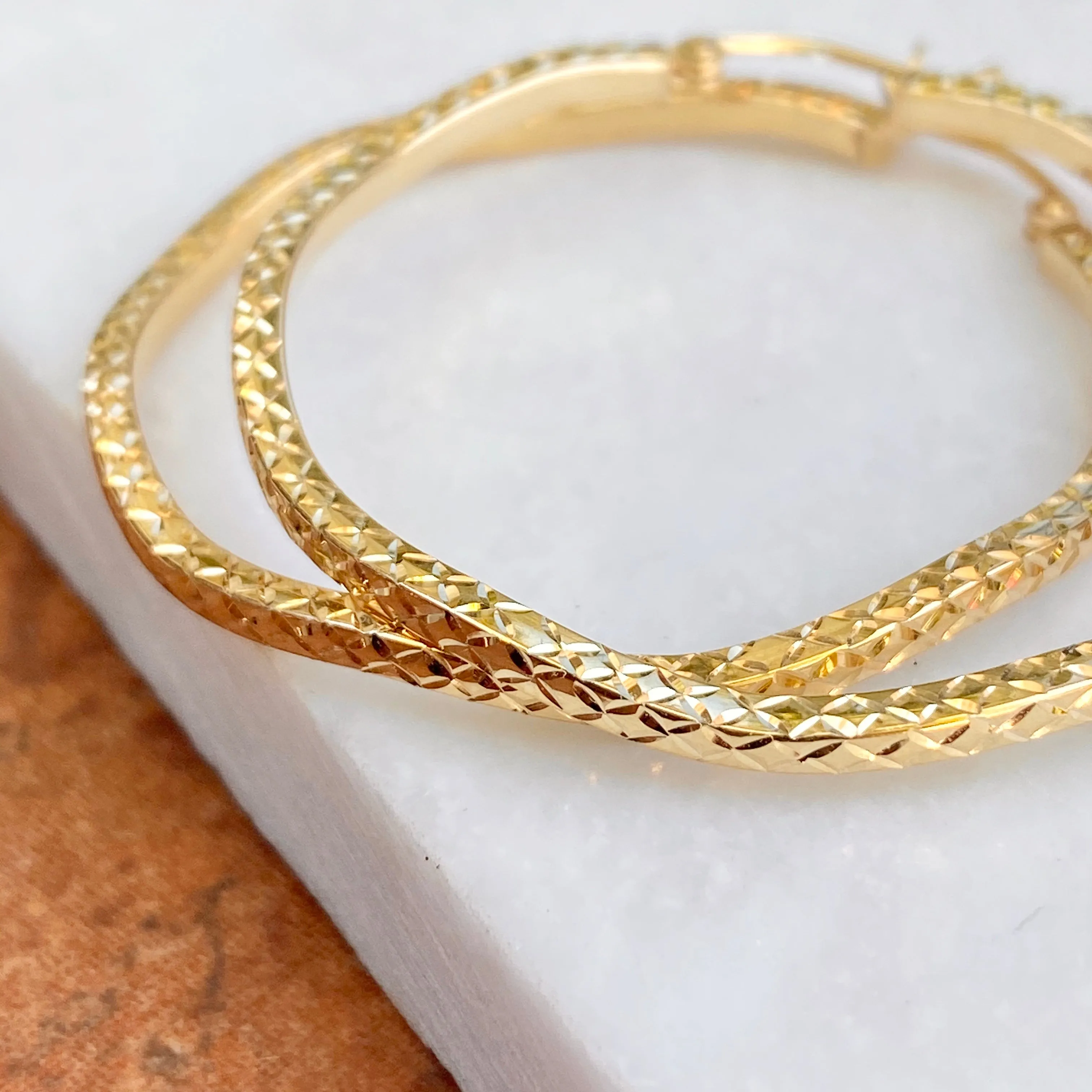 Gold-Plated Sterling Silver Wavy Diamond-Cut Hoop Earrings 41mm
