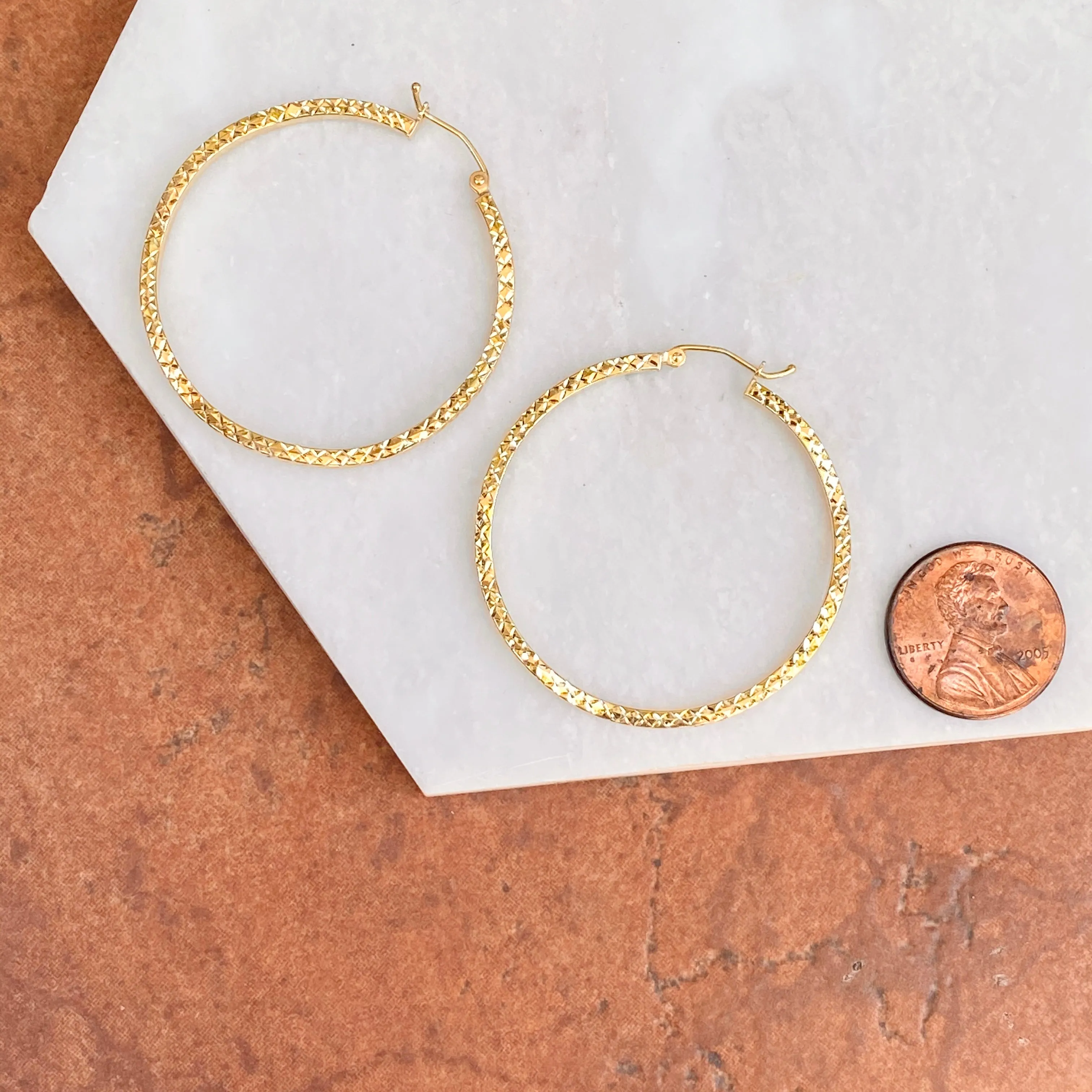 Gold-Plated Sterling Silver Wavy Diamond-Cut Hoop Earrings 41mm