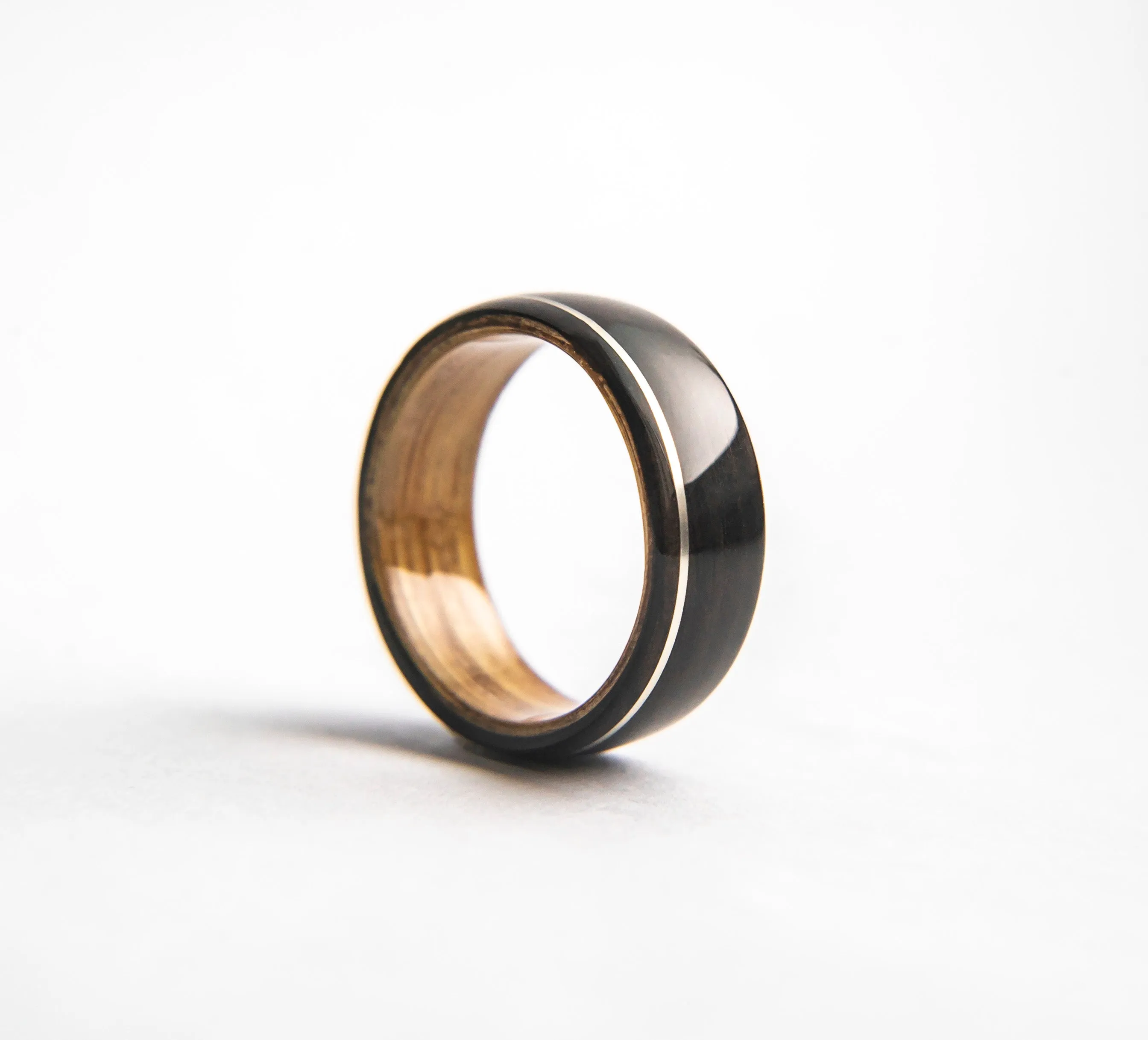 Mens Wedding band featuring Whisky Oak, Ebony with Offset Silver Inlay.