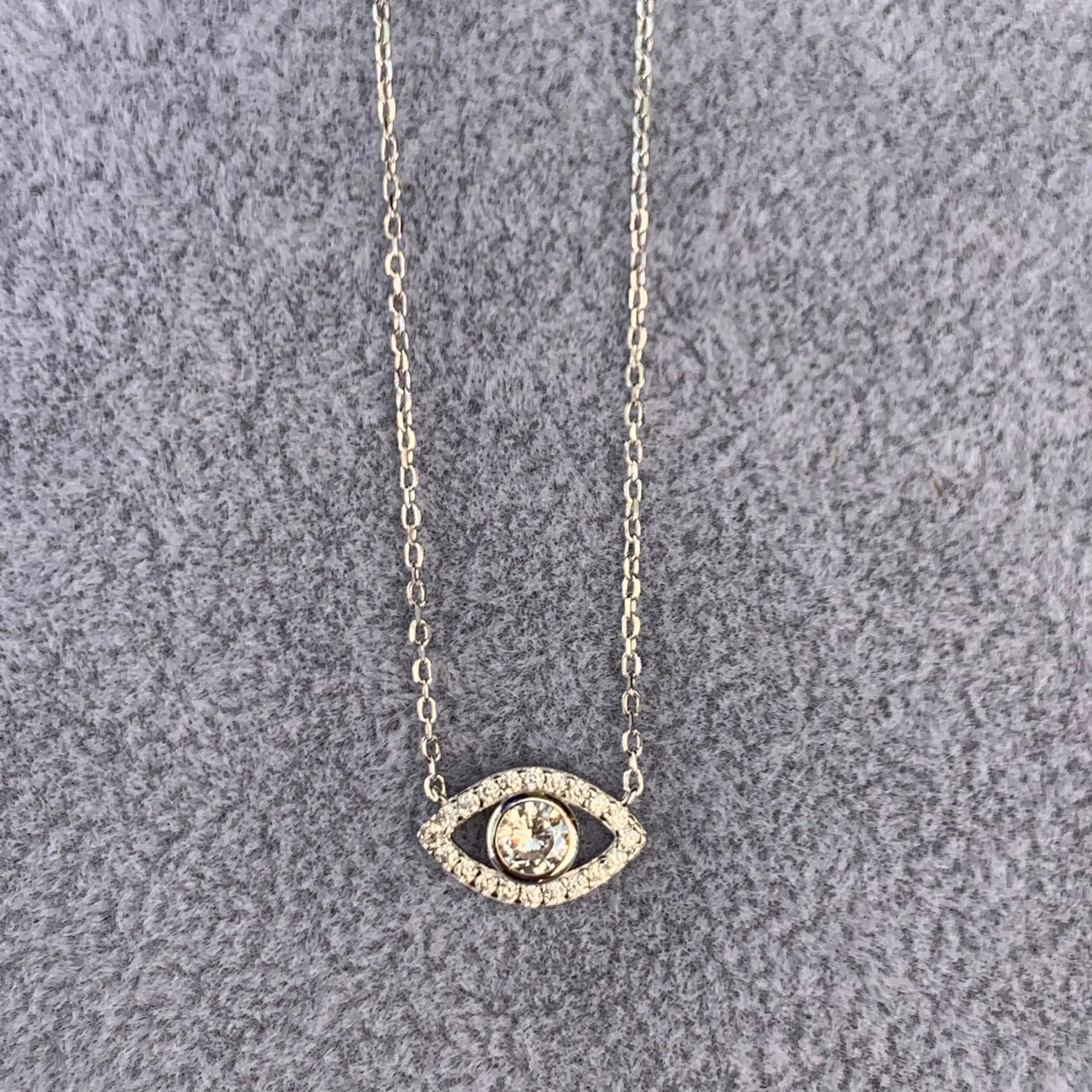 “Ojos” Sterling silver clear eye necklace
