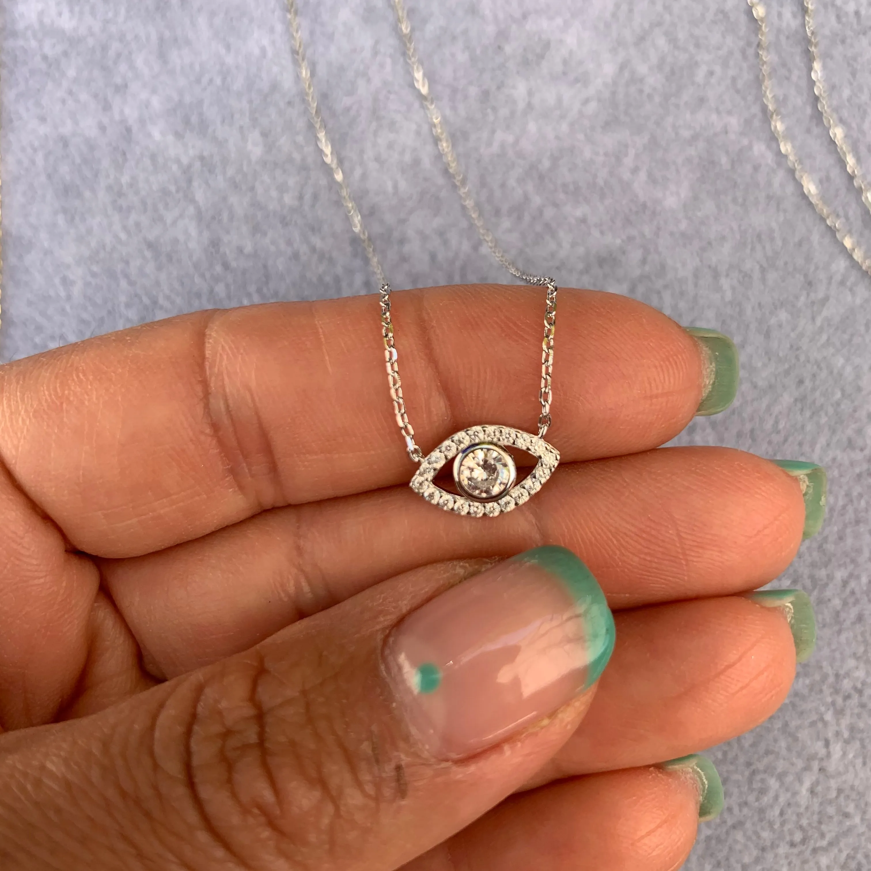 “Ojos” Sterling silver clear eye necklace