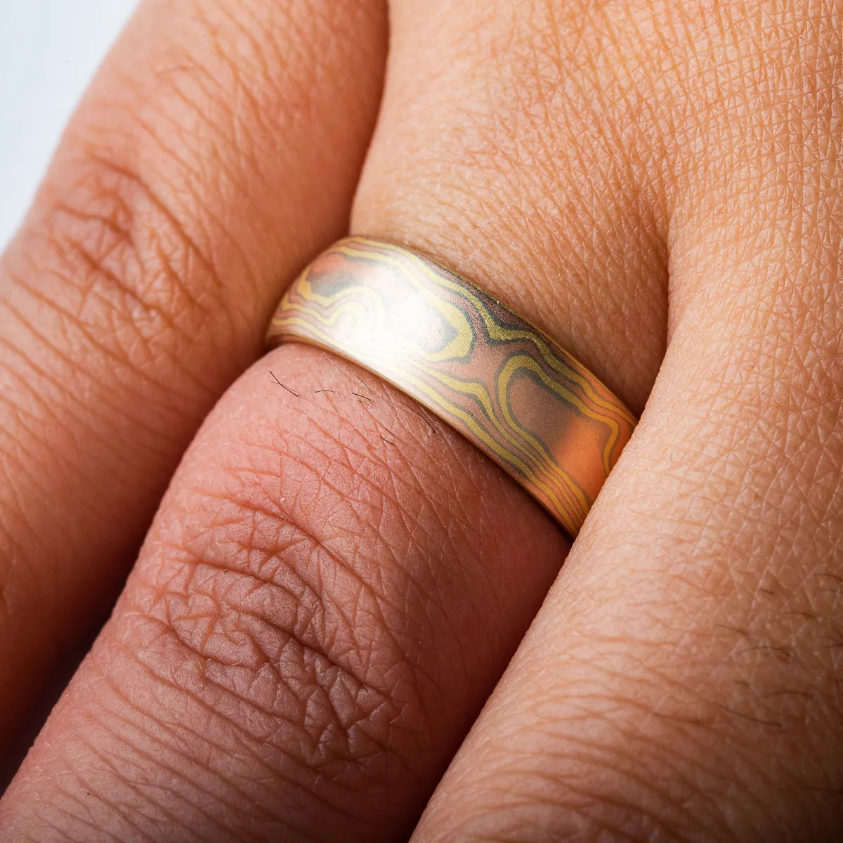 Radiant Mokume Wedding Band in Blaze Palette and Woodgrain Pattern