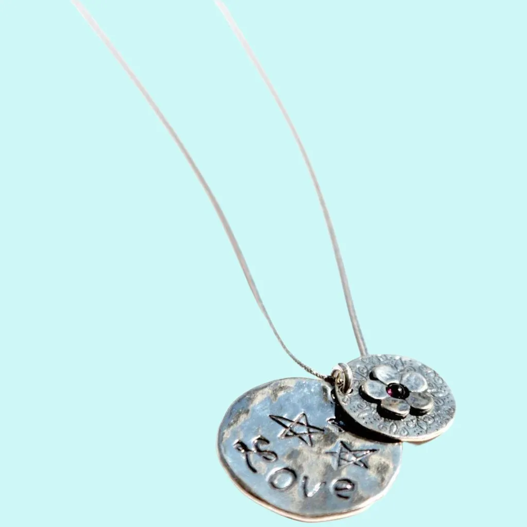 Sterling Silver Necklace with a flower motif engraved "love"