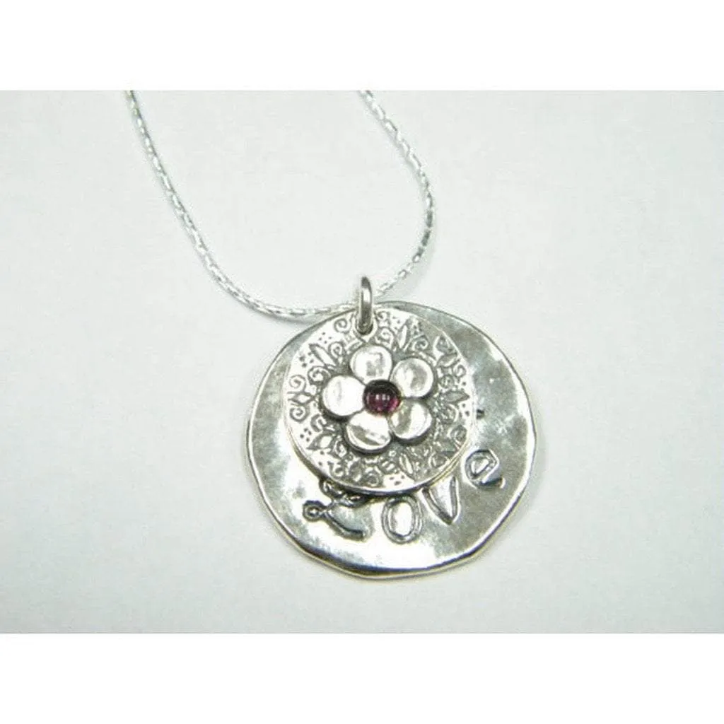 Sterling Silver Necklace with a flower motif engraved "love"