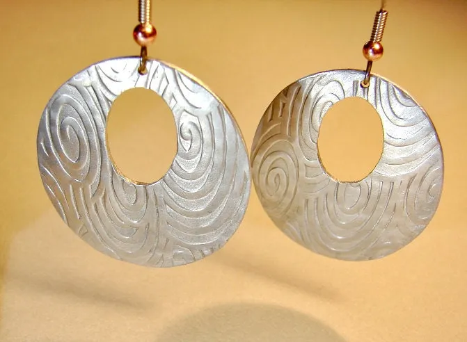 Swirls and waves on aluminum disc earrings
