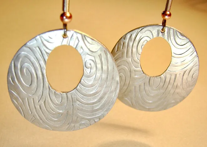 Swirls and waves on aluminum disc earrings