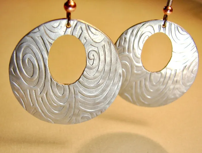 Swirls and waves on aluminum disc earrings
